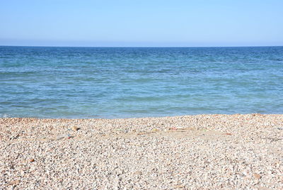 Scenic view of sea against clear sky