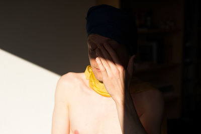 Midsection of woman eating food