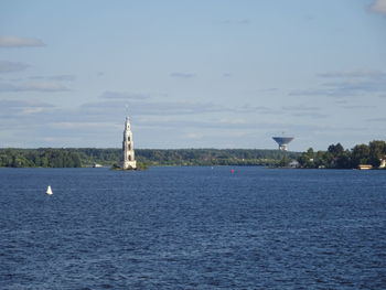 Sailboat on sea against sky
