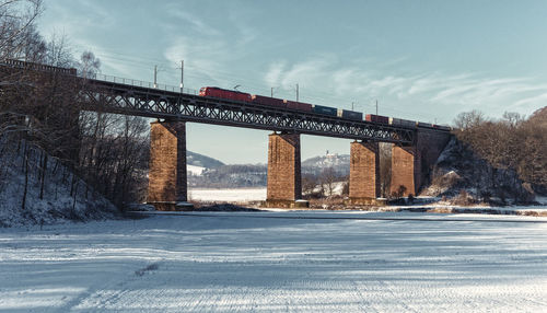 Bridge against sky during winter