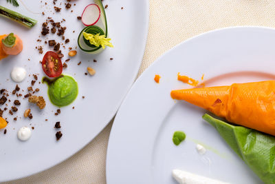 High angle view of fruits in plate on table