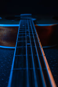 Guitar on a black background.  strings