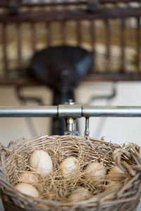 Close-up of eggs in wicker basket