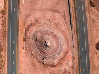 Panoramic image of a lonely, seemingly endless road in the desert of southern arizona.