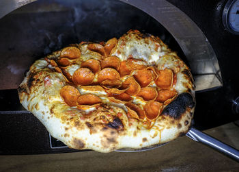 High angle view of pizza on table