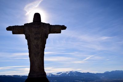 Low angle view of statue against sky