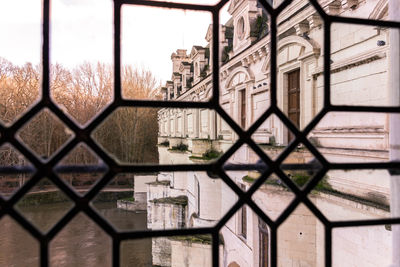 Buildings seen through window