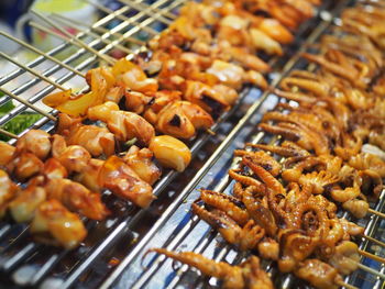 Close-up of meat on barbecue grill