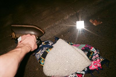 High angle view of hand holding ice cream