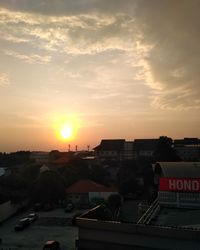 View of cityscape against sky during sunset