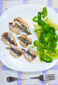 High angle view of fish served in plate