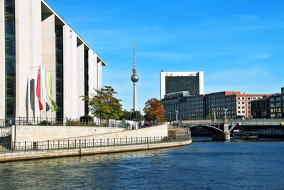 Stolperstein tichauer and television tower on spree river, germany, berlin