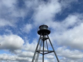 Low angle view of water tower against sky