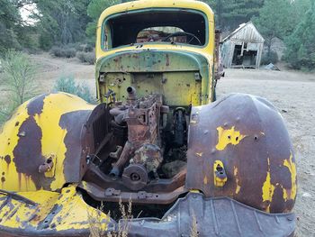 Close-up of abandoned car