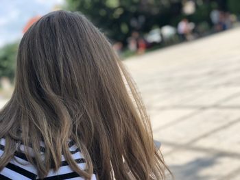 Rear view of girl with long hair