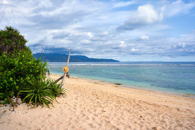 Scenic view of beach against sky