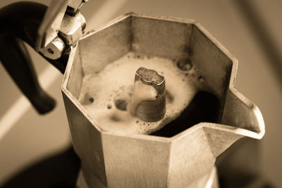 High angle view of drink in espresso maker on table