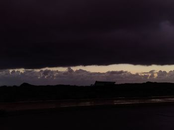 Scenic view of dramatic sky during sunset