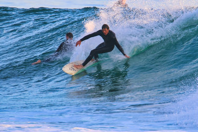 People enjoying in sea