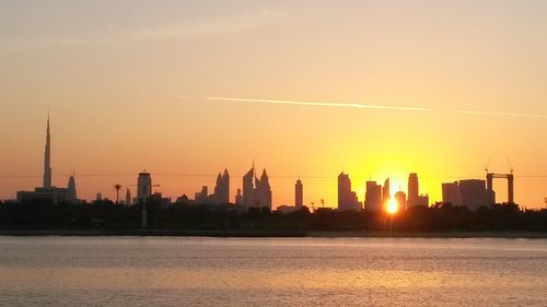 Silhouette of buildings at sunset