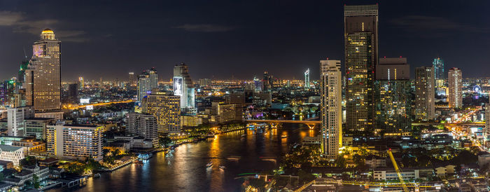 Illuminated cityscape at night