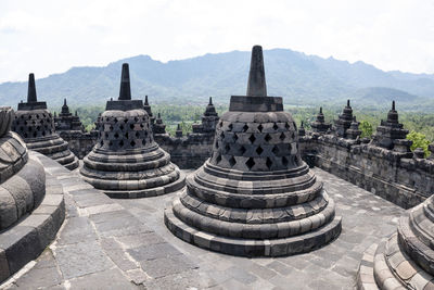 Panoramic view of temple on building against sky