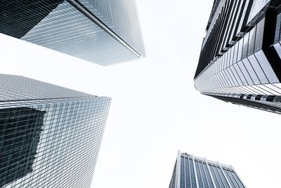 Low angle view of modern buildings against clear sky