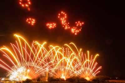 Firework display at night