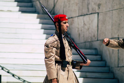 Man standing on staircase