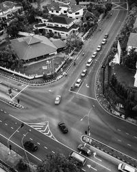 Aerial view of cars on road