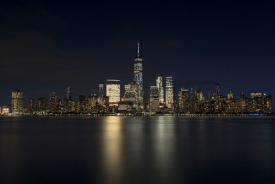 Illuminated buildings in city at night