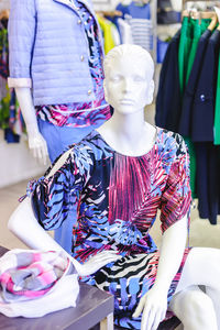 Clothing on mannequin for sale at store