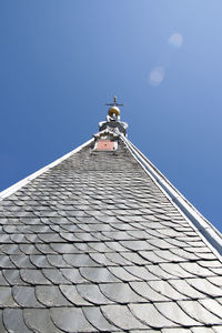 Low angle view of building against blue sky