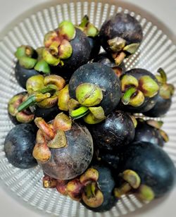 High angle view of fruits in plate on table