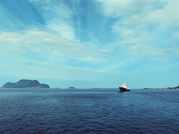 Infinity of the sea and horizon, cruise ship along the coast and islands