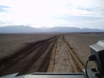 Panoramic view of railroad tracks against sky