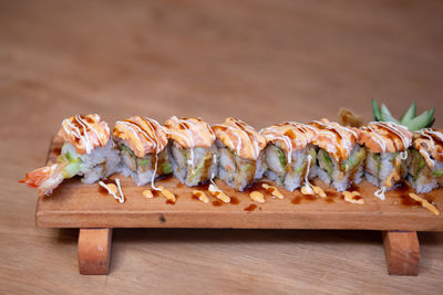 Close-up of sushi on cutting board