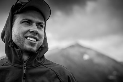 Close-up of hiker wearing hood