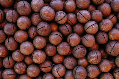 Lots of macadamia nuts on a farmer's market stall