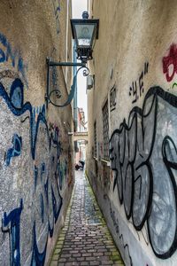 Narrow alley in front of building