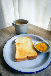 Close-up of breakfast served on table