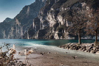 Scenic view of sea against mountain