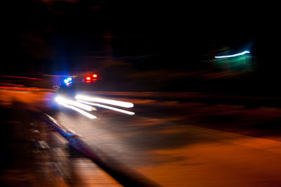 Light trails on road at night