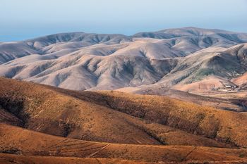 Scenic view of mountain range against sky
