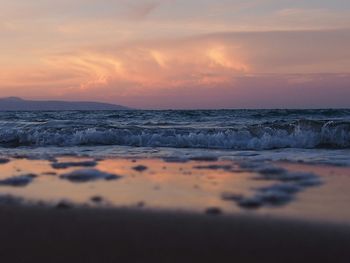 Scenic view of sea at sunset