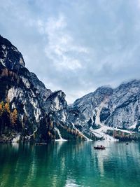 Scenic view of snowcapped mountains against sky