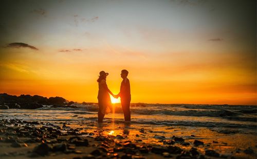 Scenic view of sea at sunset