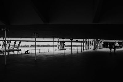 People walking on railroad station platform