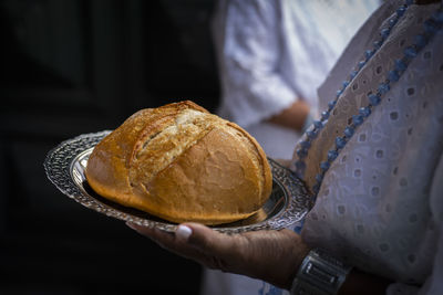 Food as an offering in candomblé being taken to the altar of the rosário dos pretos church.