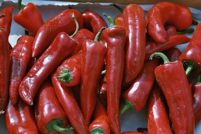 Close-up of red chili peppers at market stall